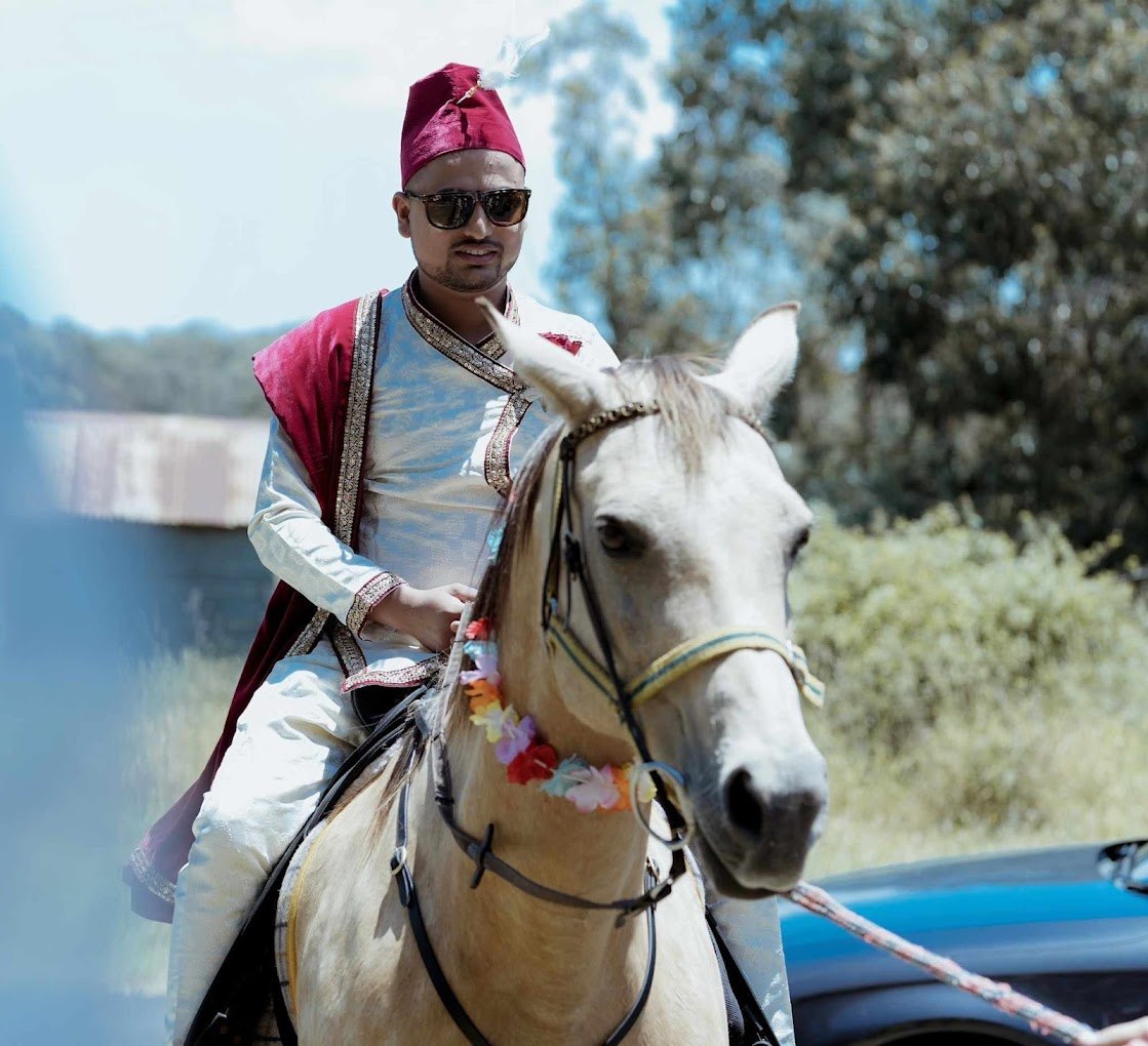 groom-on-horse.jpg